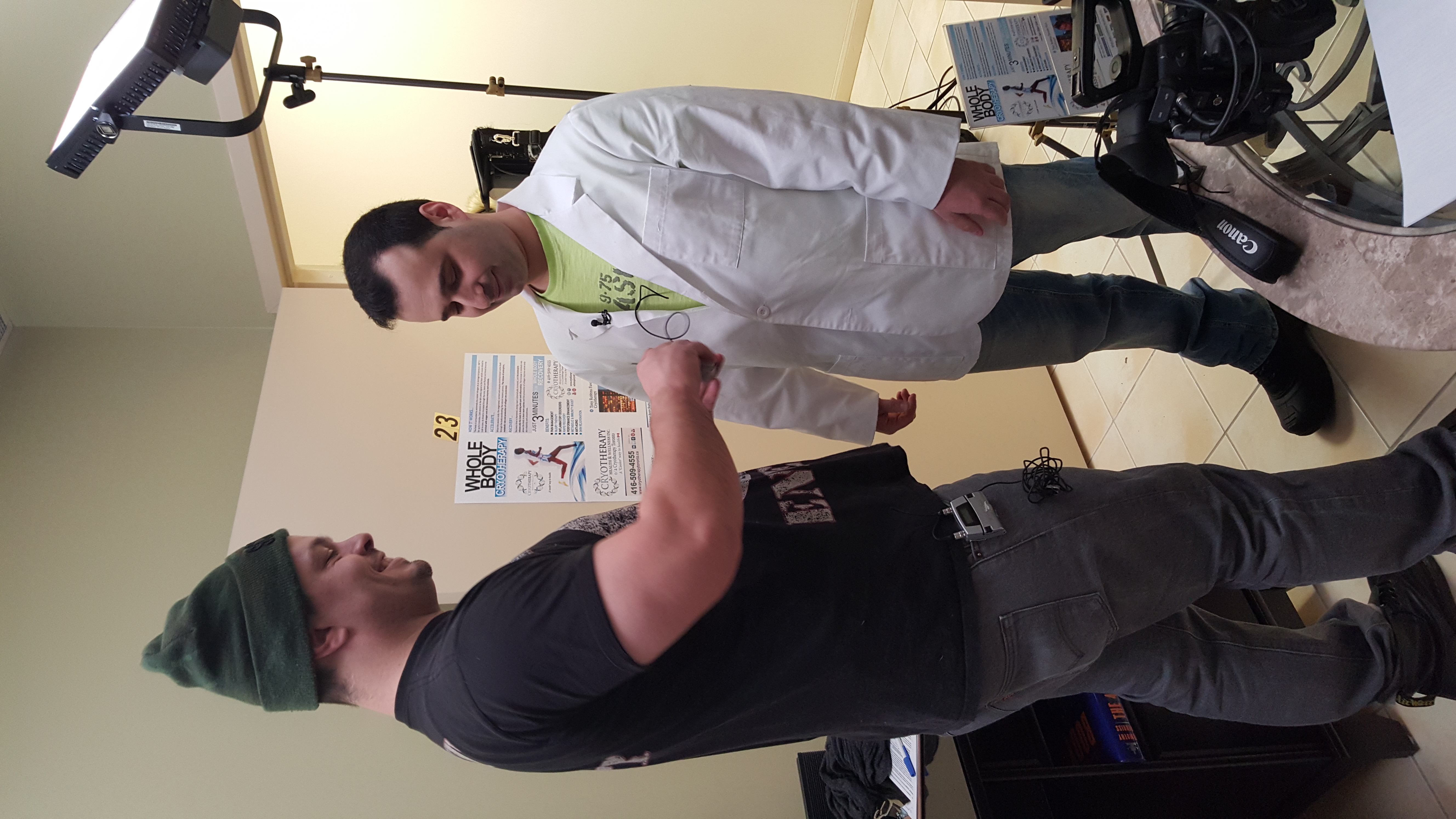 Cryotherapy Toronto technician consulting with client during session