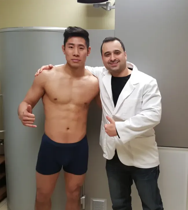 Client with staff member at Cryotherapy Toronto facility